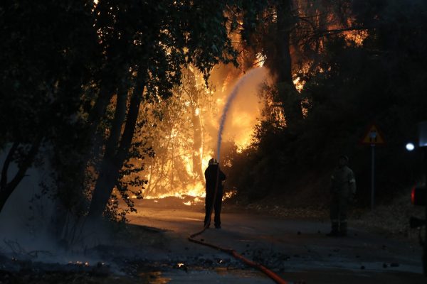 Seven major wildfires rage across Greece on Tues.